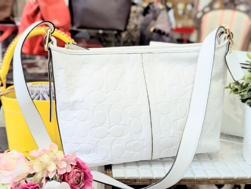 クロスボディバッグのコーチ