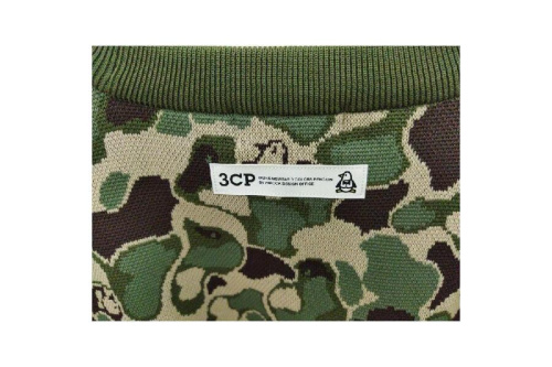 マンシングウェア(Munsingwear)のゴルフコースカモフラジャカードセーター