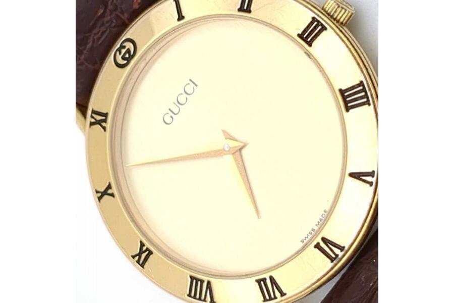 GUCCI ゴールド レザー 時計 型番3000.2M 不動 - メルカリ